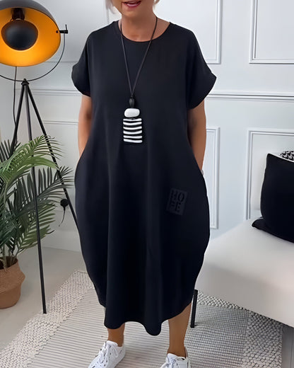 Margot | Robe t-shirt ample à manches retroussées pour femme